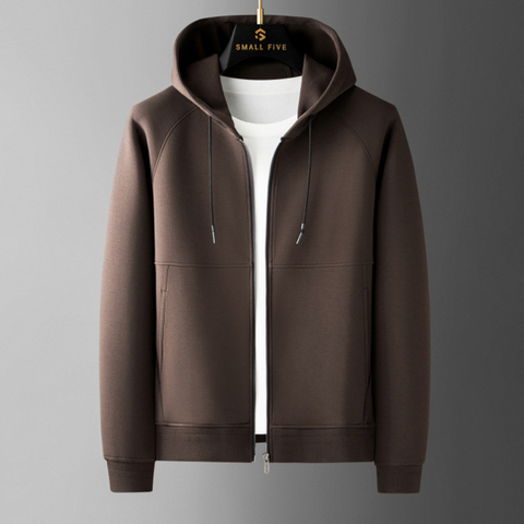 Brown zip-up hoodie with white drawstrings and interior, displayed on hanger against gray background.