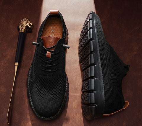 Black knit lace-up shoe with tan leather trim and brown sole, shown from top and side views. Gold horse-head cane displayed