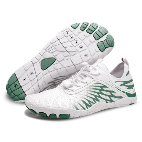 White and green athletic shoes with cushioned soles and zigzag stripe pattern, shown from side and sole view against white