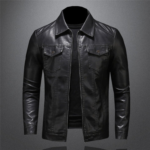 Black leather jacket with chest pockets, collared neckline, and front zipper on gray background.